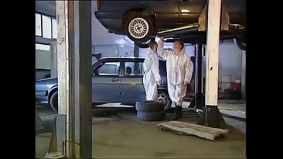 High class lady drilled by mechanics in garage